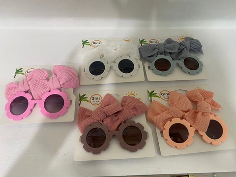 Girls sunglasses with 2 x matching hair clips.