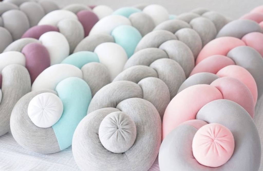 Tri colour twisted cot bumpers imported and local range The Cuddler